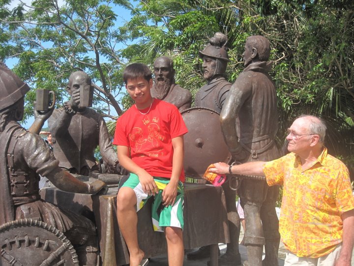 Local etiquette - A man admiring a historic memorial with his son